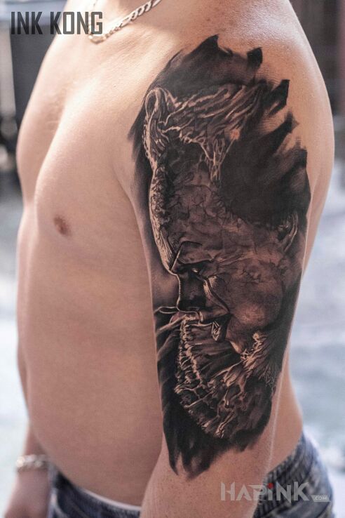 Tattoo "It" Klaun in characters motif and realistic style on the upper arm