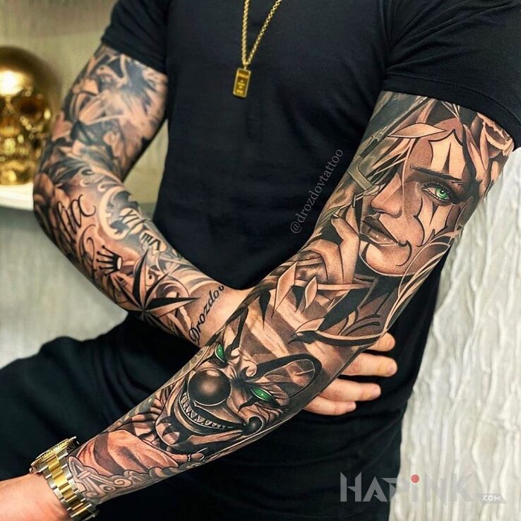 Tattoo Diabelski klaun in black and gray motif and realistic style on the forearm