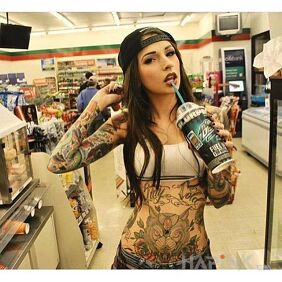 Tattoo Skate girl on the upper arm motif: sexy