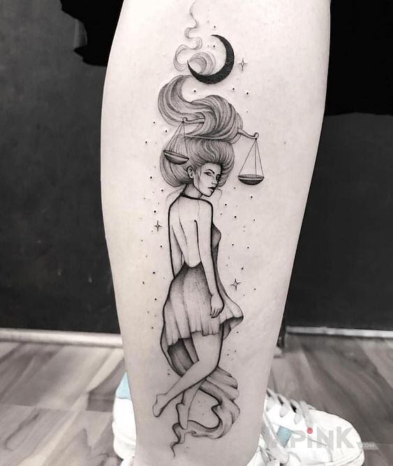 Tattoo Waga in zodiac signs motif and graphic / illustrative style on the calf