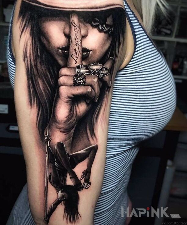 Tattoo Ciuchutko in black and gray motif and realistic style on the upper arm