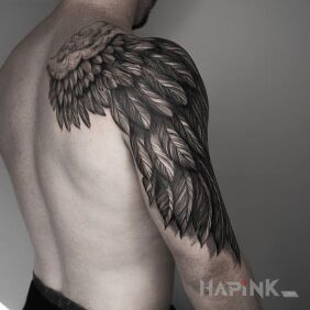 Tattoo Wing on the shoulder blades motif: wings style: realistic