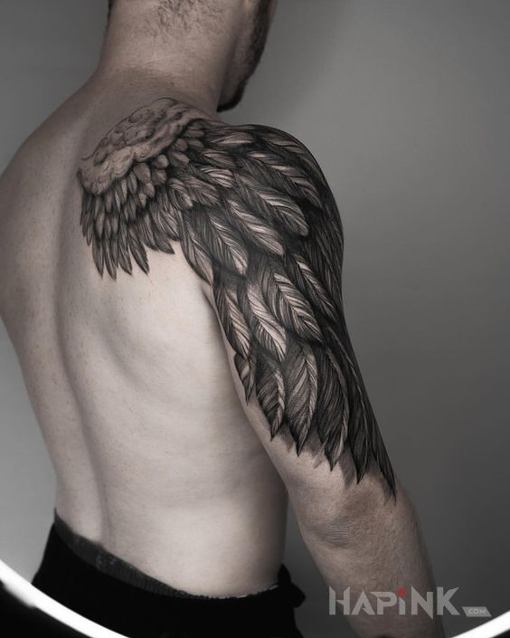 Tattoo Skrzydło in wings motif and realistic style on the shoulder blades