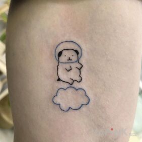 Tattoo A dog in the clouds on the leg motif: animals style: minimalistic