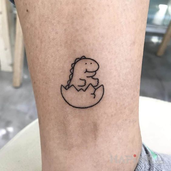 Tattoo Dino in animals motif and contour / linework style near the ankle