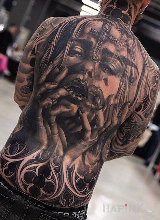 Tattoo Rozmyta twarz in faces motif and realistic style on the shoulder blades