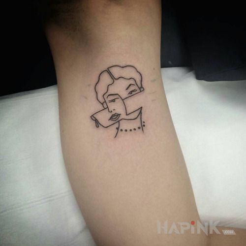 Tattoo Przesunięta twarz in faces motif and minimalistic style on the forearm