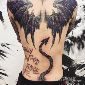 Tattoo Devil on the back motif: wings style: realistic