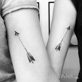 Tattoo Two shots on the upper arm motif: black and gray style: graphic / illustrative