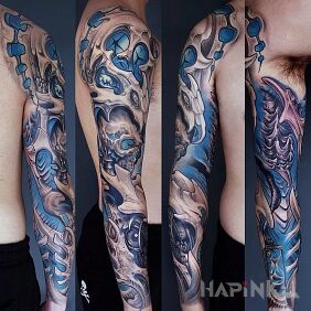 Tattoo Skull and eye in organics on the upper arm motif: skulls style: organic