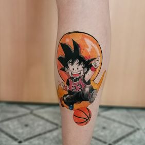 Tattoo Dragon Ball Son Goku manga on the calf motif: manga / anime style: cartoon / comic book