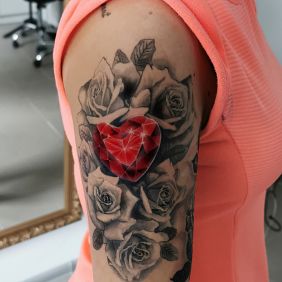 Tattoo Diamond Rose on the upper arm motif: objects style: graphic / illustrative