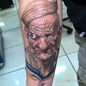 Tatuaż Popeye na przedramieniu motyw: postacie styl: realistyczne