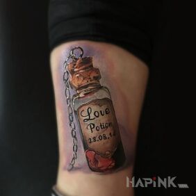 Tattoo Love drink on the leg motif: lettering