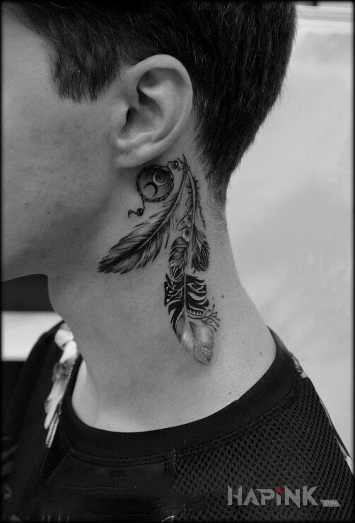 Tattoo Pióro za uchem in black and gray motif and realistic style behind the ear