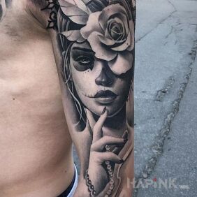 Tattoo A rose in your hair on the forearm motif: religious style: realistic
