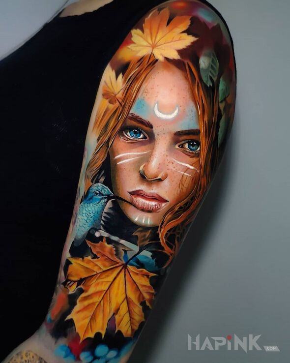 Tattoo Jesień in faces motif and realistic style on the upper arm