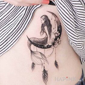 Tattoo Siren on the ribs motif: characters style: graphic / illustrative