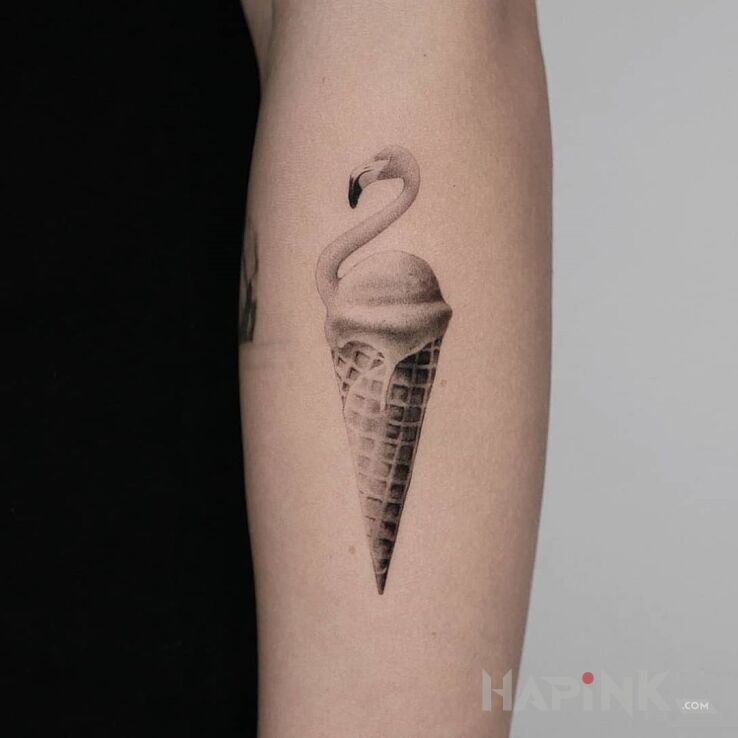 Tattoo Flaming in black and gray motif and graphic / illustrative style on the upper arm