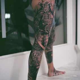 Tattoo Samurai with a tiger on the calf motif: legsleeves style: realistic
