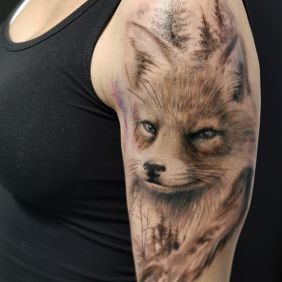 Tattoo Vixen Fox on the upper arm motif: animals style: realistic