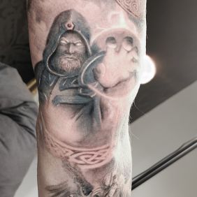 Tattoo Wizard on the upper arm motif: fantasy style: realistic
