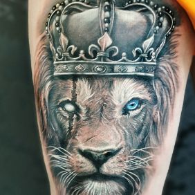 Tattoo Lion King on the leg motif: animals style: realistic