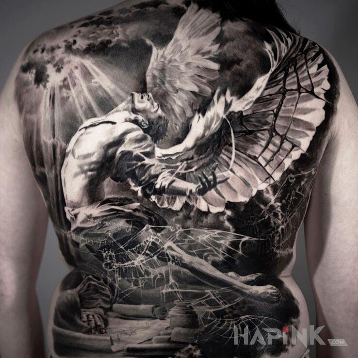 Tattoo Anioł w pajęczynie ??? in wings motif and realistic style on the shoulder blades