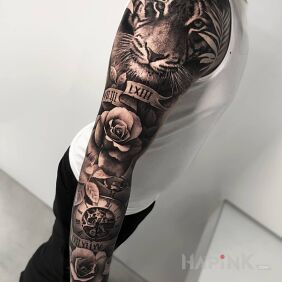 Tattoo Tiger's hand on the forearm motif: animals style: realistic