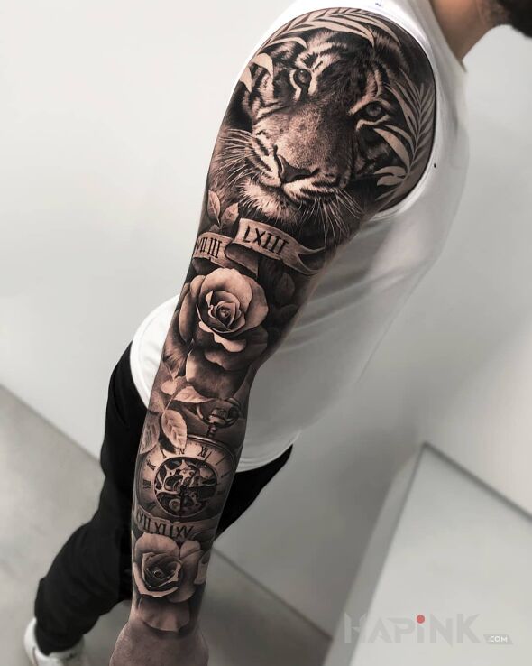 Tattoo Tygrysia ręka in sleeves motif and realistic style on the forearm