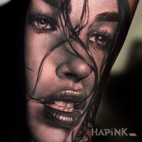 Tattoo Wonderful portrait on the forearm motif: black and gray style: realistic