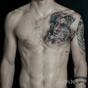 Tattoo Chest decorated with a jellyfish head on the chest motif: animals style: realistic
