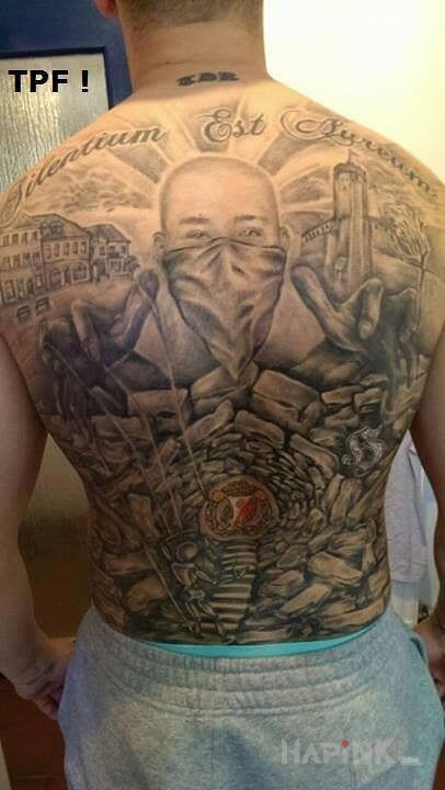 Tattoo Hooligans Widzew in religious motif on the back