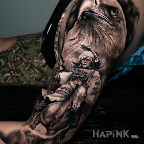 Tattoo Eagle with Indian on the upper arm motif: animals style: realistic