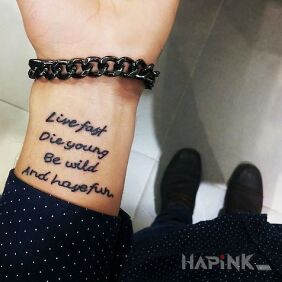 Tattoo What to do for a living on the wrist motif: lettering style: calligraphy