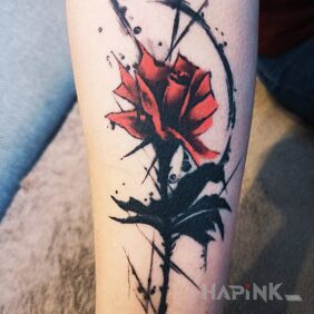 Tattoo Rose on the forearm motif: flowers style: blackwork / blackout