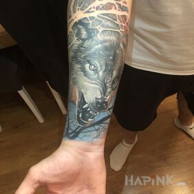 Tattoo Wolf on the forearm motif: animals style: realistic