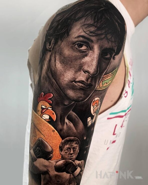 Tattoo Rocky in faces motif and realistic style on the upper arm