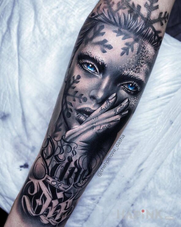 Tattoo Lodowa dama in faces motif and calligraphy style on the forearm