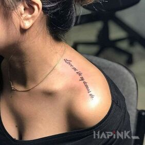 Tattoo Love me on the upper arm motif: lettering