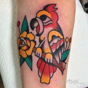 Tattoo Parrot / Rose / Flower on the forearm motif: animals style: oldschool
