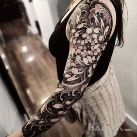 Tattoo Chrysanthemum 2 on the forearm motif: flowers style: japanese / irezumi