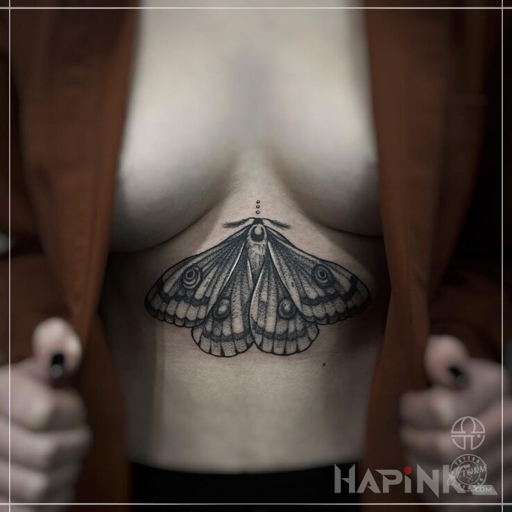Tattoo Ćma in butterflies motif and graphic / illustrative style on the stomach