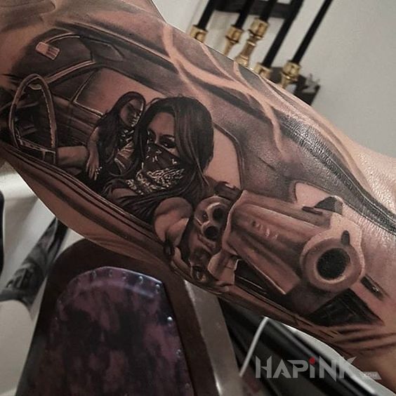 Tattoo Giwera in characters motif and realistic style on the upper arm