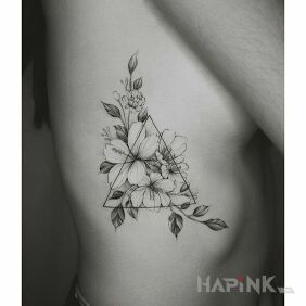 Tattoo Flowers and triangle on the ribs motif: flowers style: graphic / illustrative