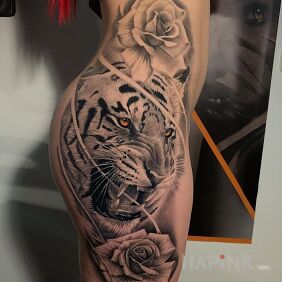 Tattoo The Tiger and the Two Roses on the buttocks motif: black and gray style: realistic