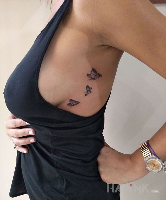 Tattoo 3 motylki in butterflies motif and realistic style on the ribs