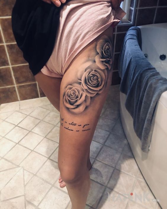 Tattoo 3 roze in black and gray motif and realistic style on the leg