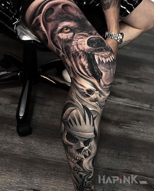 Tattoo Ogromny wilk in animals motif and realistic style on the calf