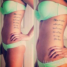 Tattoo Inscription on ribs on the ribs motif: lettering